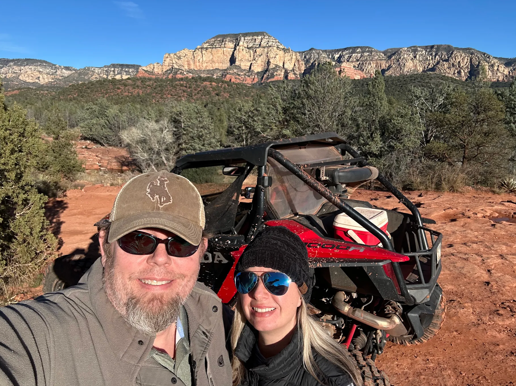 Family riding a UTV rental through Sedona backcountry