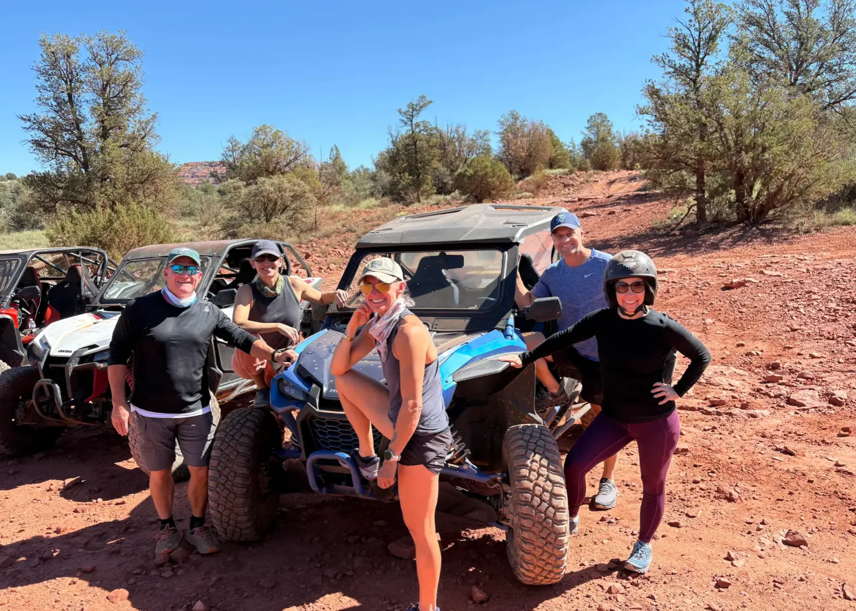 Family riding a UTV rental through Sedona backcountry