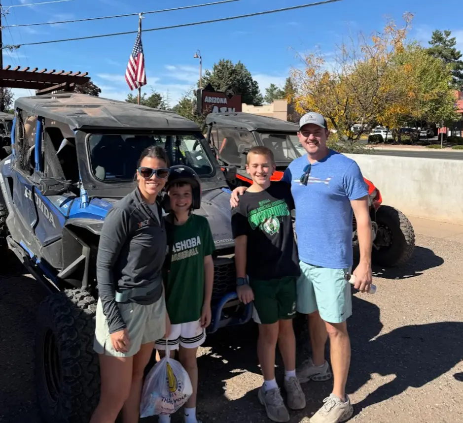 Family riding a UTV rental through Sedona backcountry